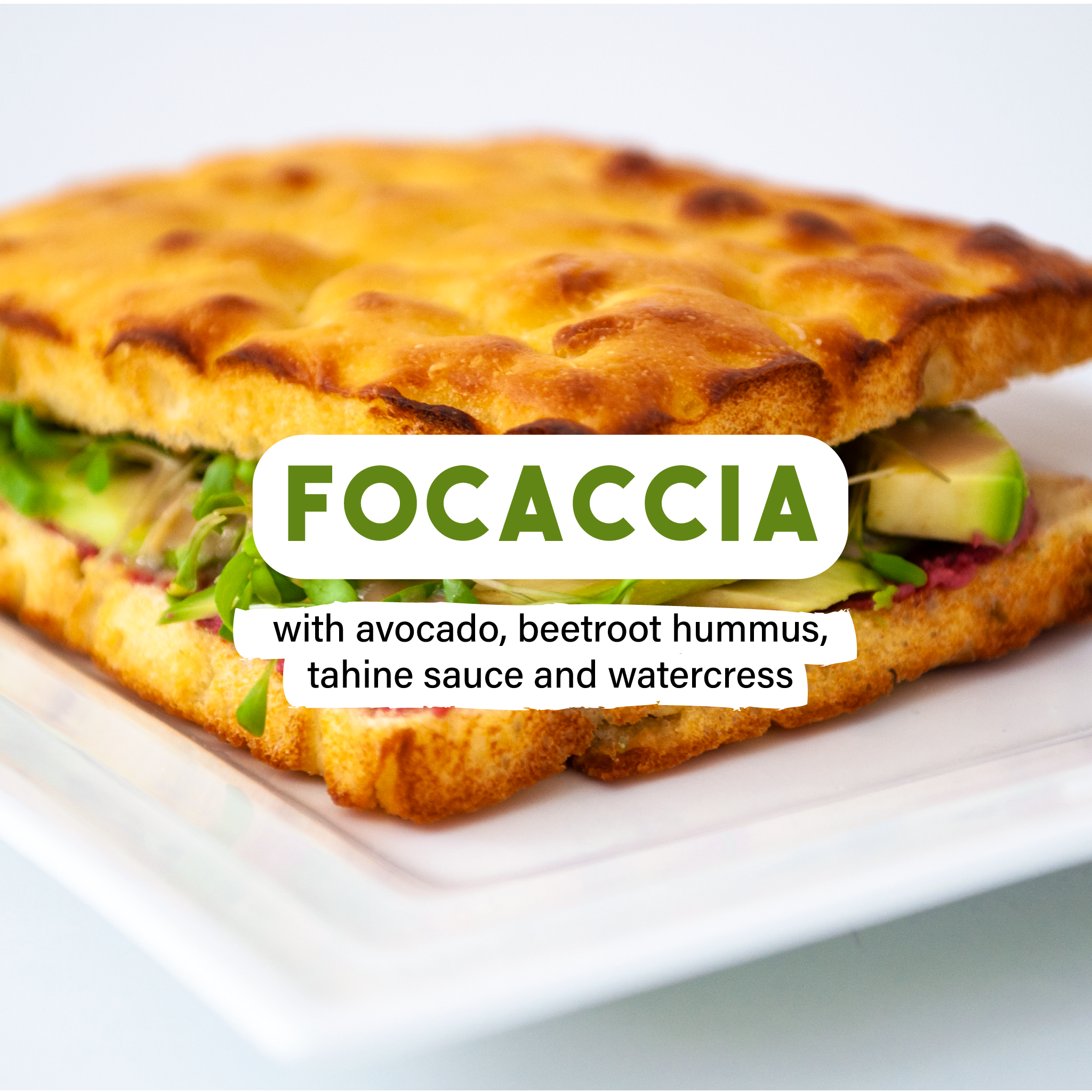 Focaccia with avocado, beetroot hummus, tahine sauce and watercress