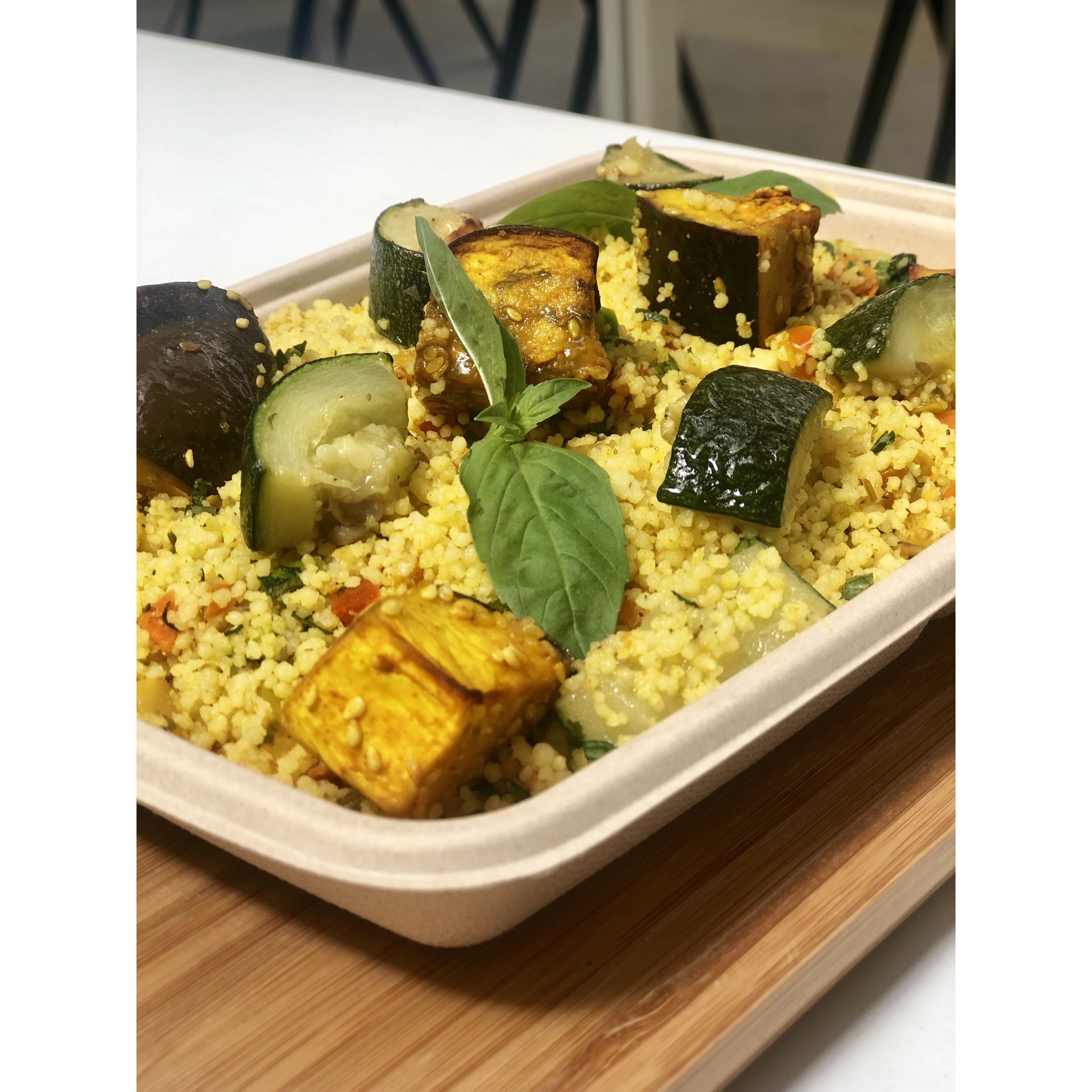 Couscous with curcuma and seasonal backed vegetables